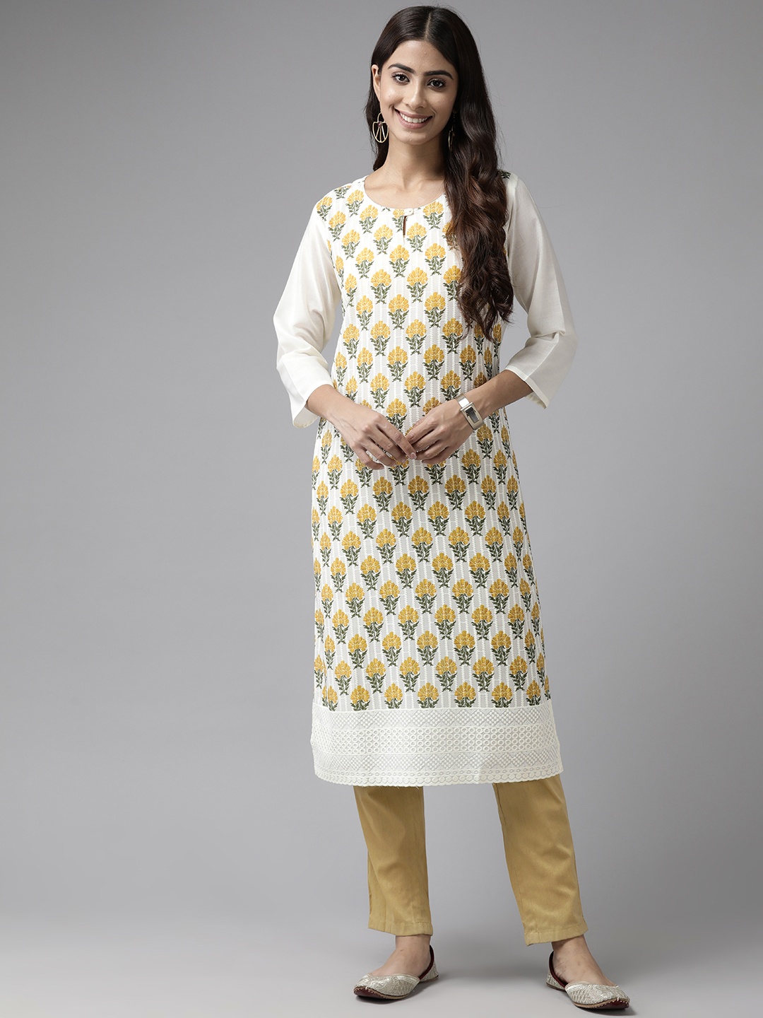 

Aarika Women Cream-Coloured & Mustard Yellow Floral Printed Keyhole Neck Floral Kurta