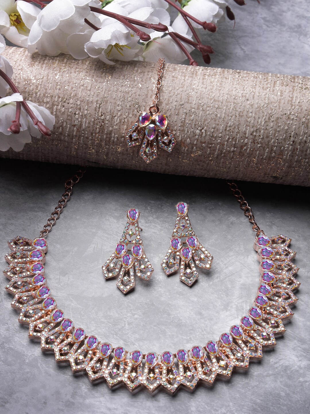 

Sukkhi Rose Gold Plated Stones Studded Choker Necklace Jewellery Set