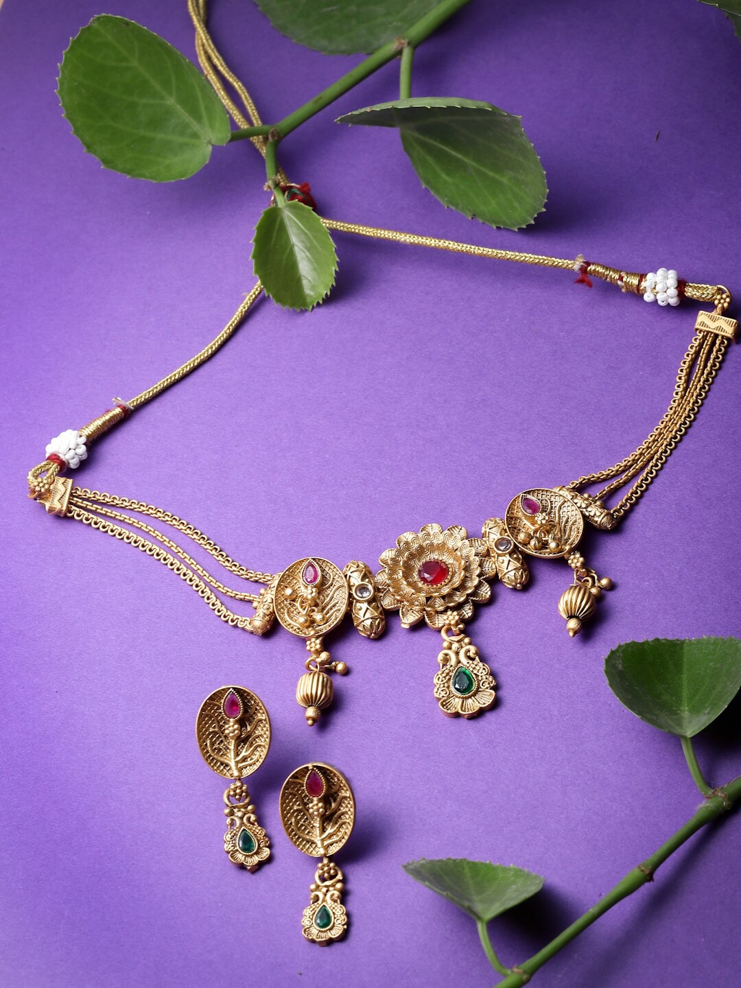 

Sukkhi Gold-Plated Peacock Copper Choker Necklace Jewellery Set