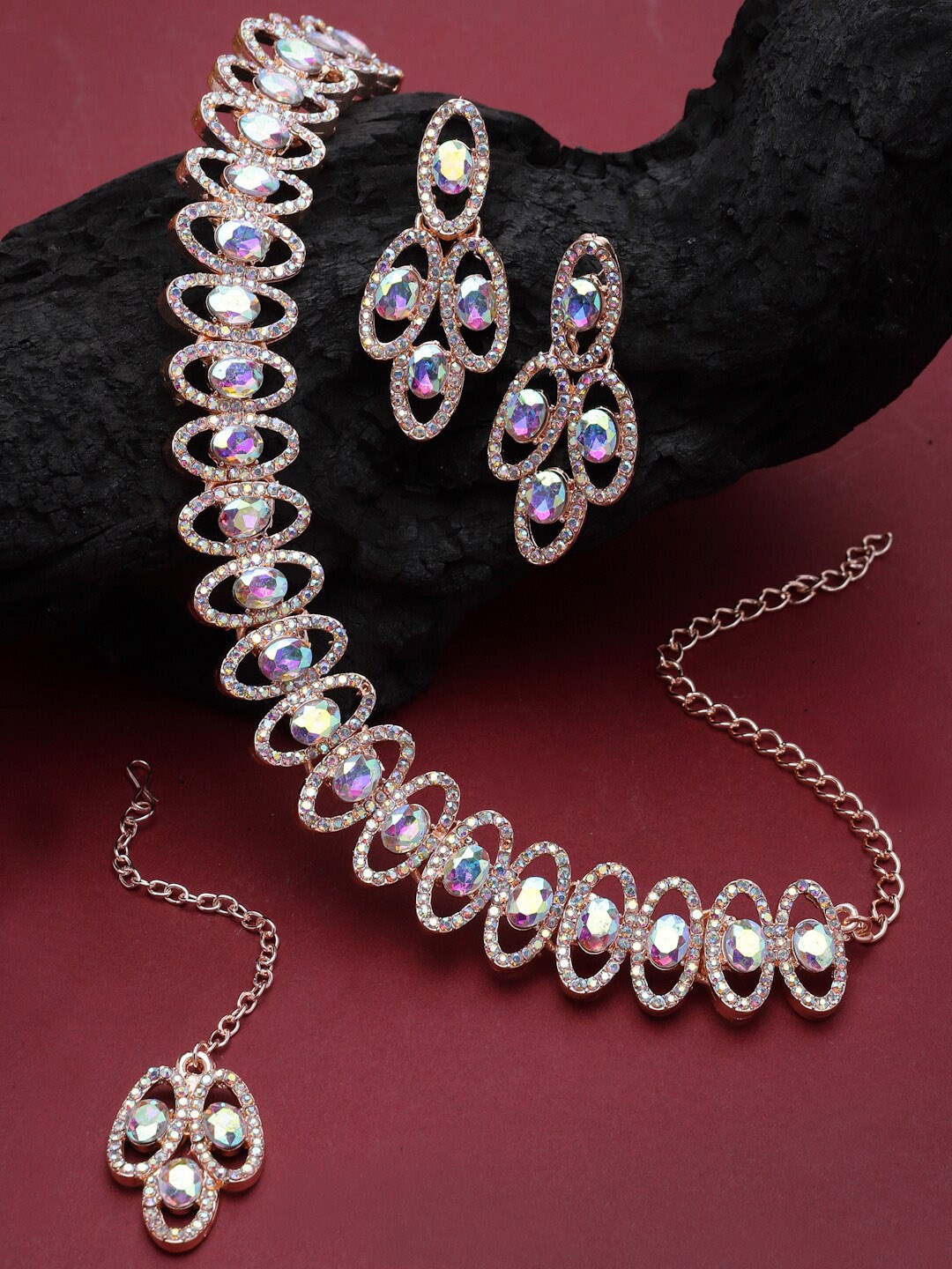 

Sukkhi Rose Gold-Plated Stone Studded Jewellery Set