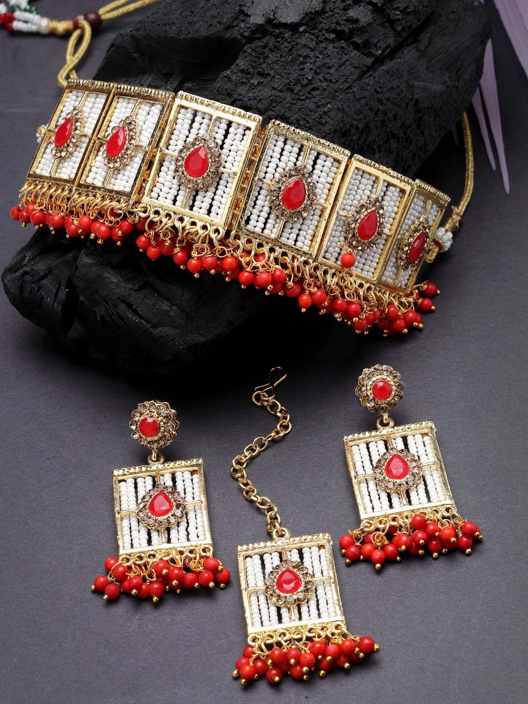 

Sukkhi Gold-Plated Stone-Studded & Beaded Jewellery Set