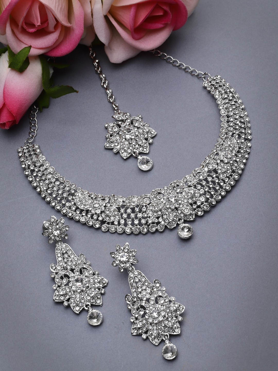 

Sukkhi Women Silver Rhodium-Plated AD Stone -Studded & Beaded Jewellery Set