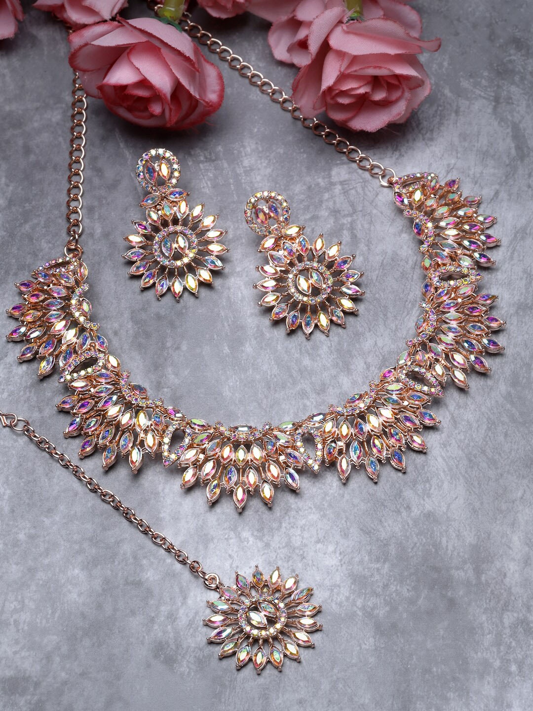 

Sukkhi Rose Gold Plated Rainbow Stones Studded Necklace With Earrings And Maang Tika