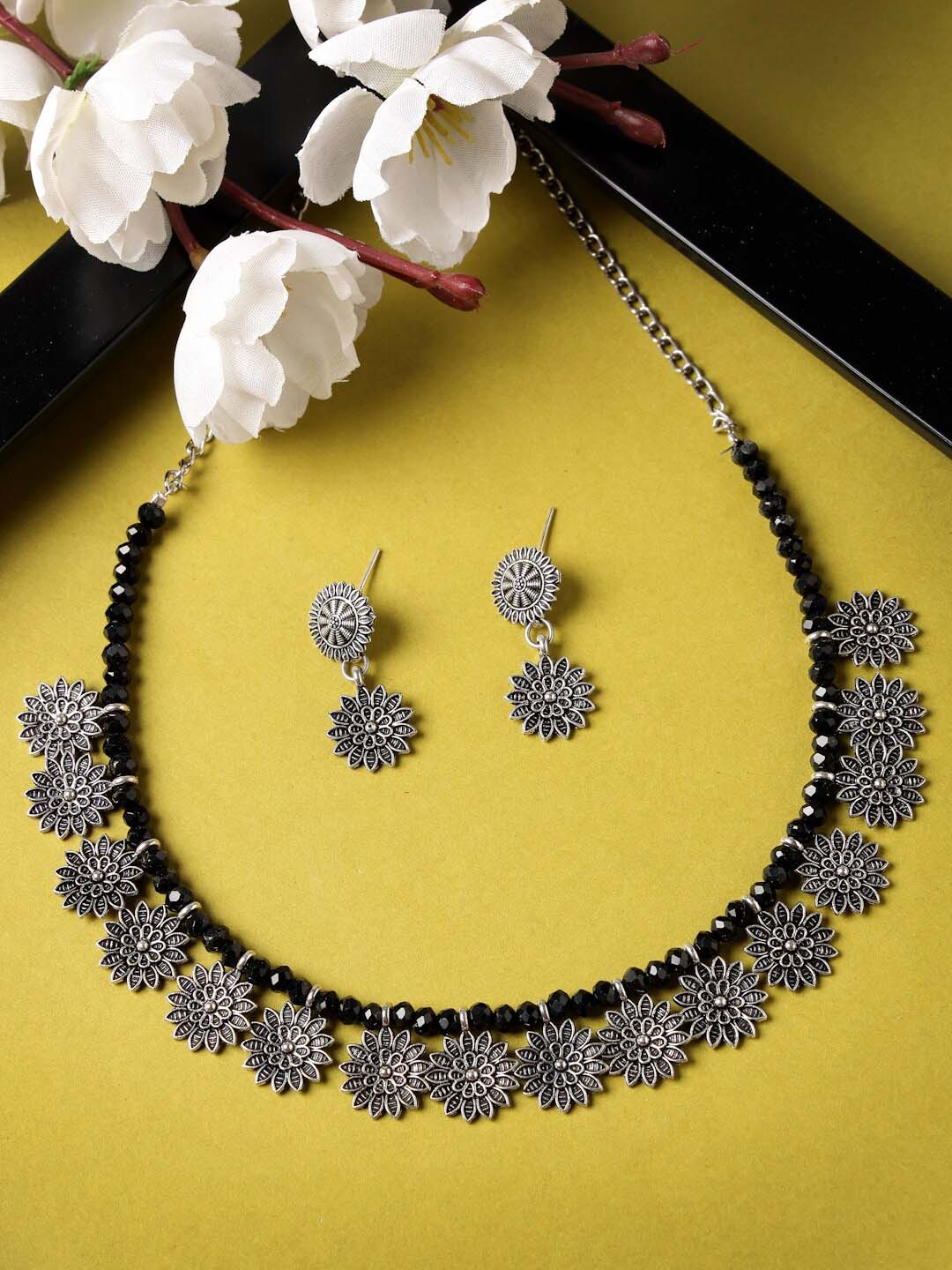 

Sukkhi Silver-Plated Oxidised-Floral Shaped Jewellery Set