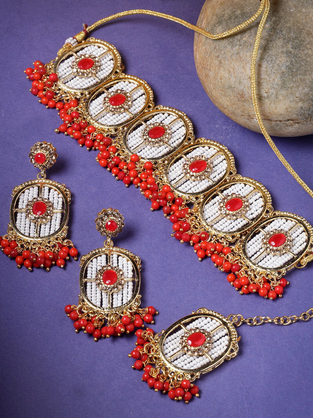 

Sukkhi Gold-Plated Stones-Studded & Beaded Jewellery Set