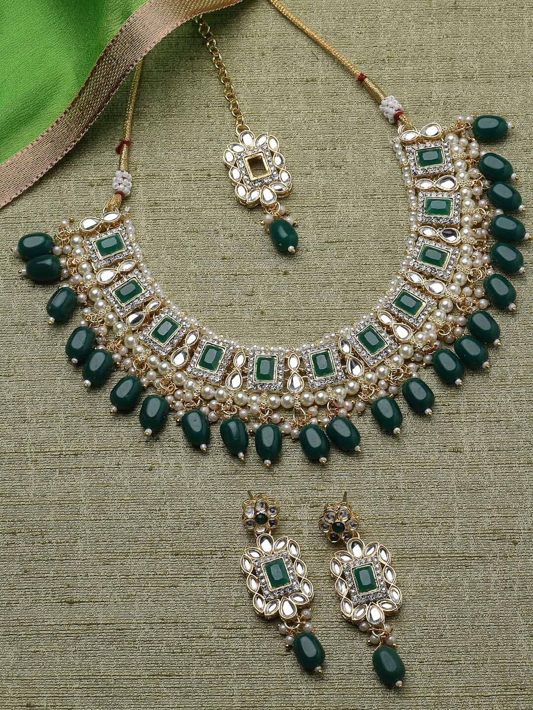 

Sukkhi Gold-Plated Stone-Studded & Beaded Jewellery Set