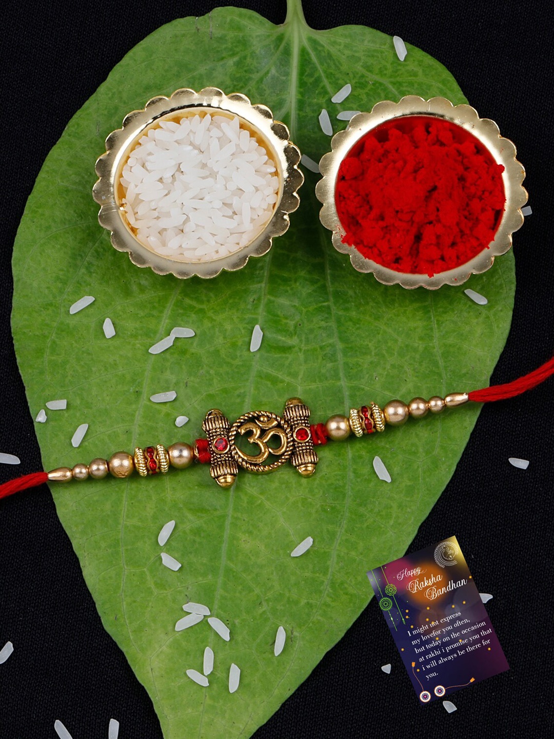 

Silver Shine Unisex Set Of 2 Om & Bhai Rakhi With Roli Rice & Greeting Card, Gold