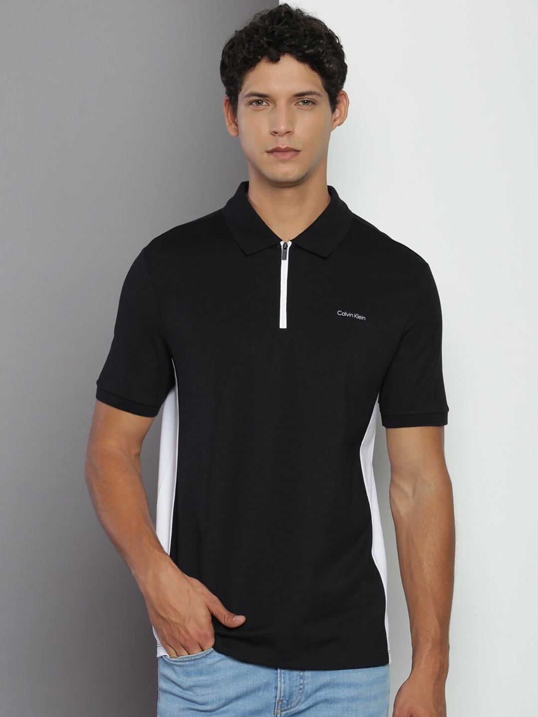 

Calvin Klein Jeans Colourblocked Polo Collar Cotton Regular T-shirt, Black