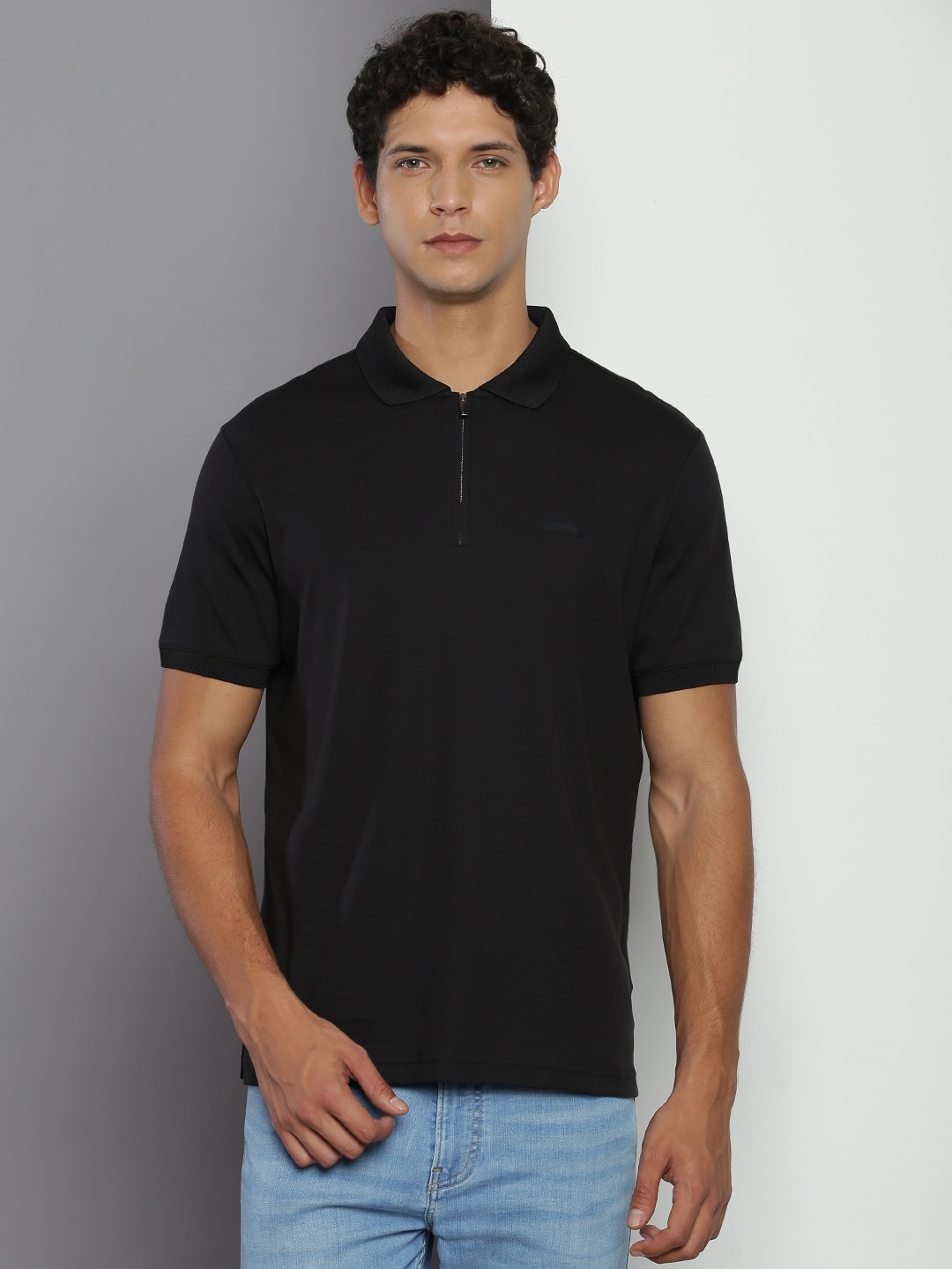 

Calvin Klein Jeans Polo Collar Regular Fit Pure Cotton T-shirt, Black