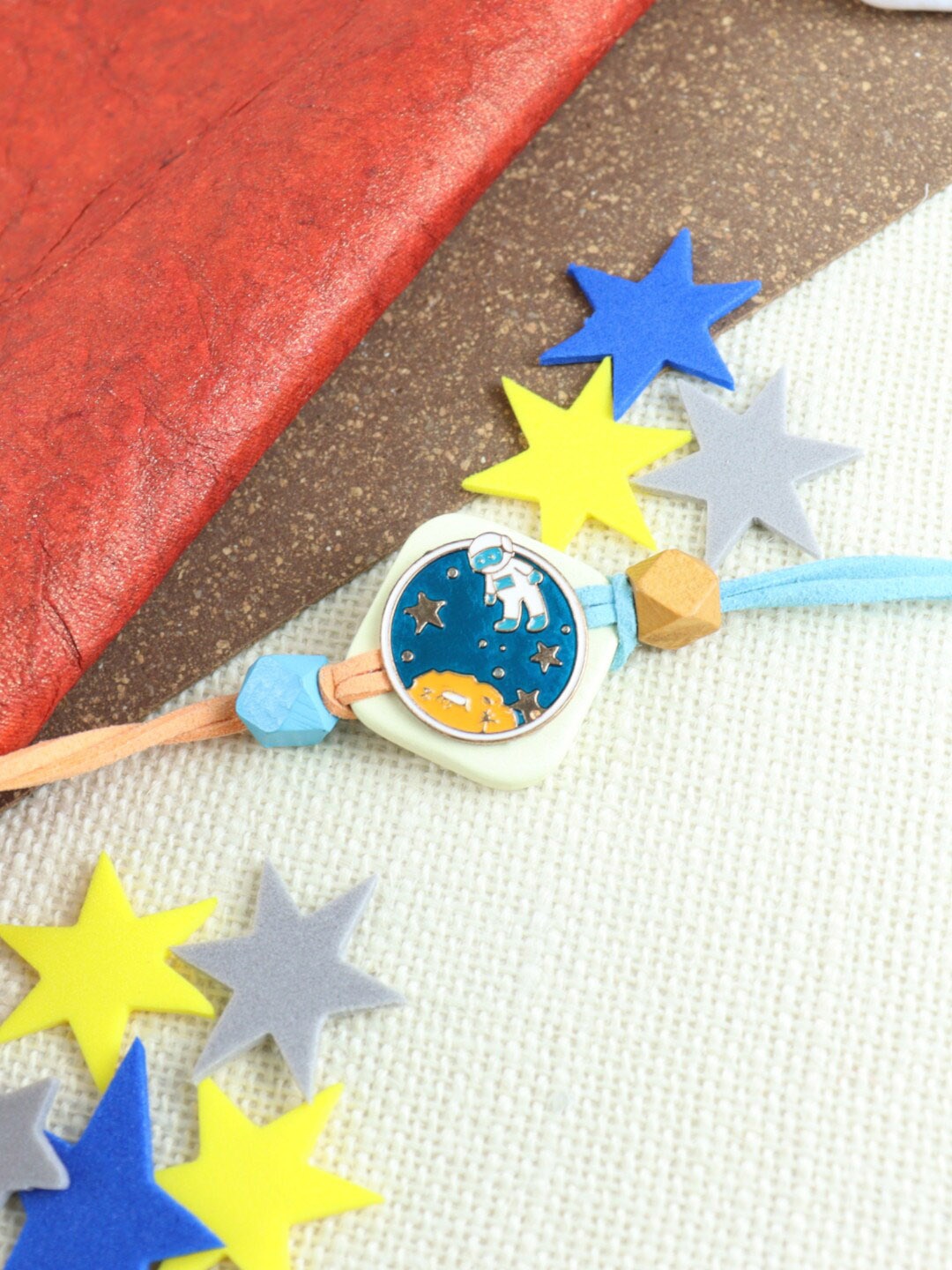 

Asthetika Boys Astronaut Earth Charm Beaded Rakhi, Blue