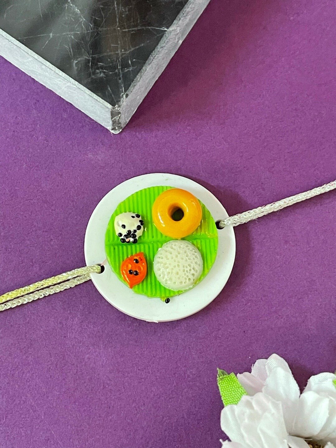 

Digital Dress Room Boys Food-Charm Studded Thread Rakhi, Green