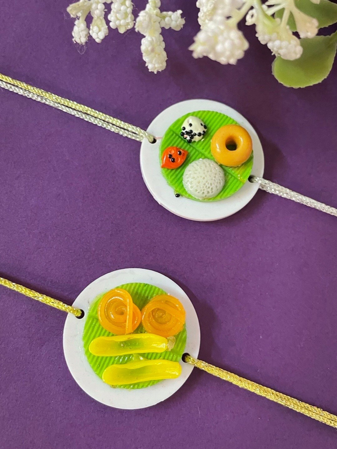 

Digital Dress Room Boys Set Of 2 Food-Charm Studded Rakhi, Green