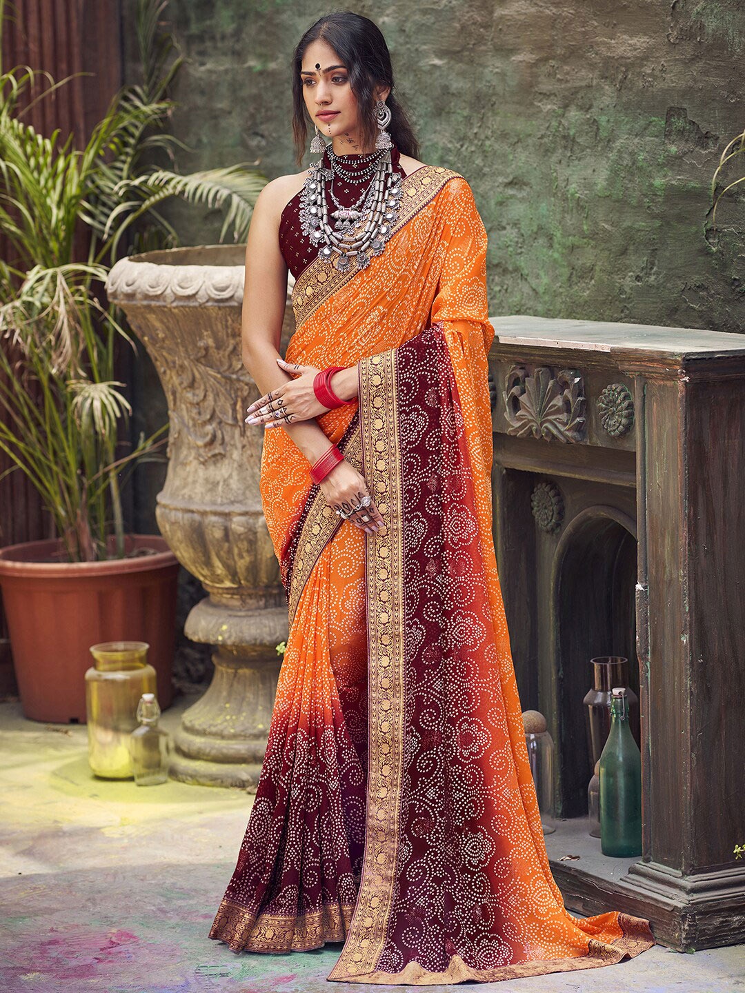 

Saree mall Orange & Mauve Bandhani Printed Zari Pure Georgette Saree