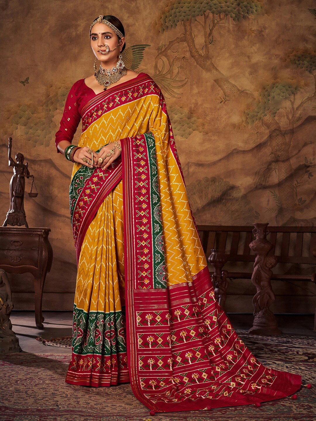 

Saree mall Yellow & Red Ethnic Motifs Printed Patola Saree