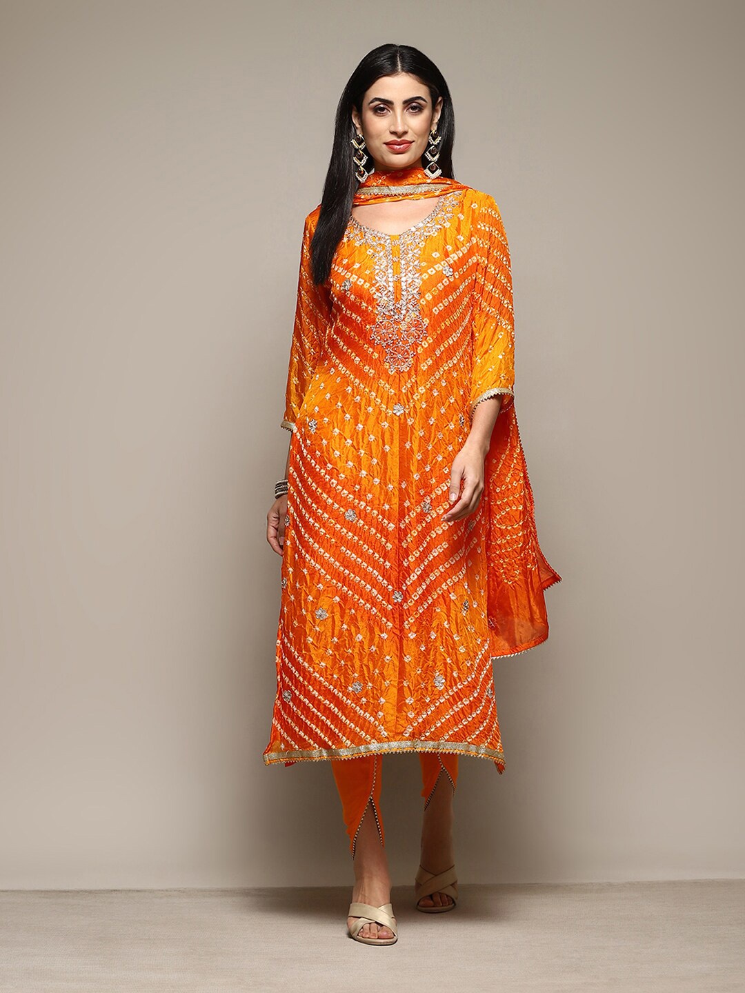 

Biba Bhandhani Printed Beads And Stones Embellished Unstitched Dress Material, Mustard