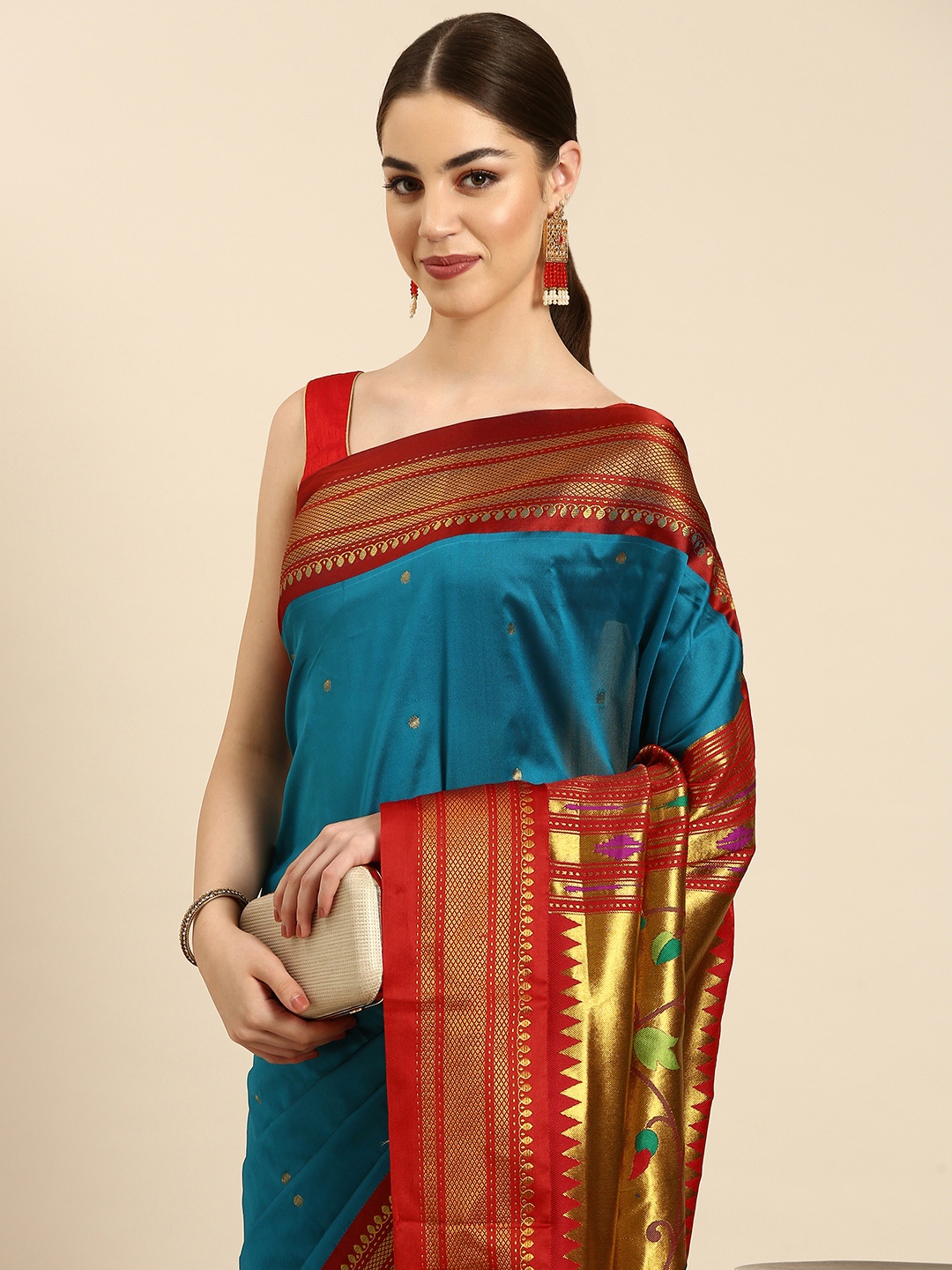

Varkala Silk Sarees Ethnic Motifs Zari Silk Blend Handloom Paithani Saree, Turquoise blue