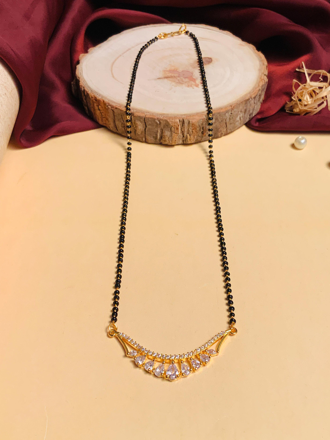 

ABDESIGNS Gold-plated AD-studded & Beaded Mangalsutra