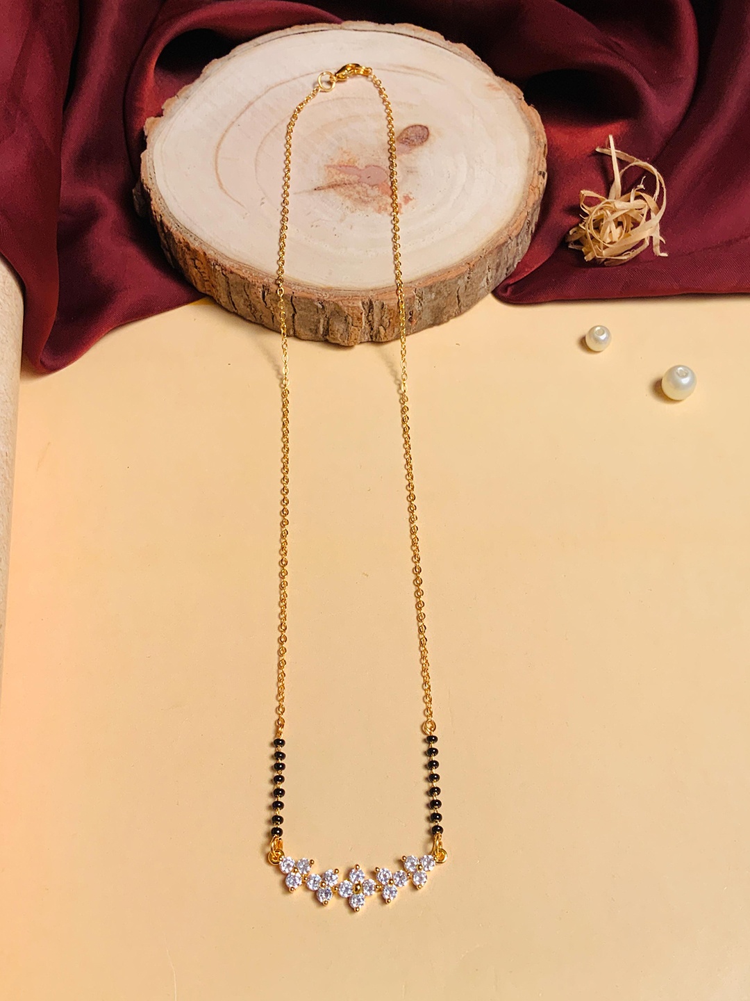 

ABDESIGNS Gold-Plated AD Studded Floral Shaped Detail Mangalsutra