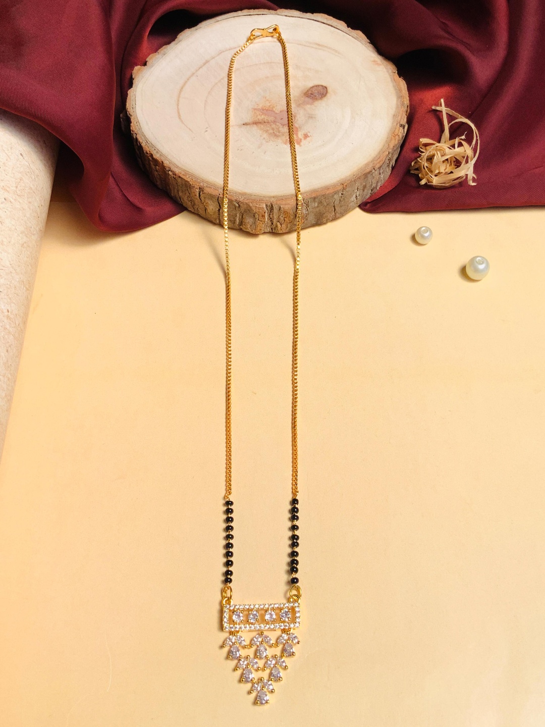 

ABDESIGNS Gold-Plated AD Stone-Studded & Beaded Mangalsutra