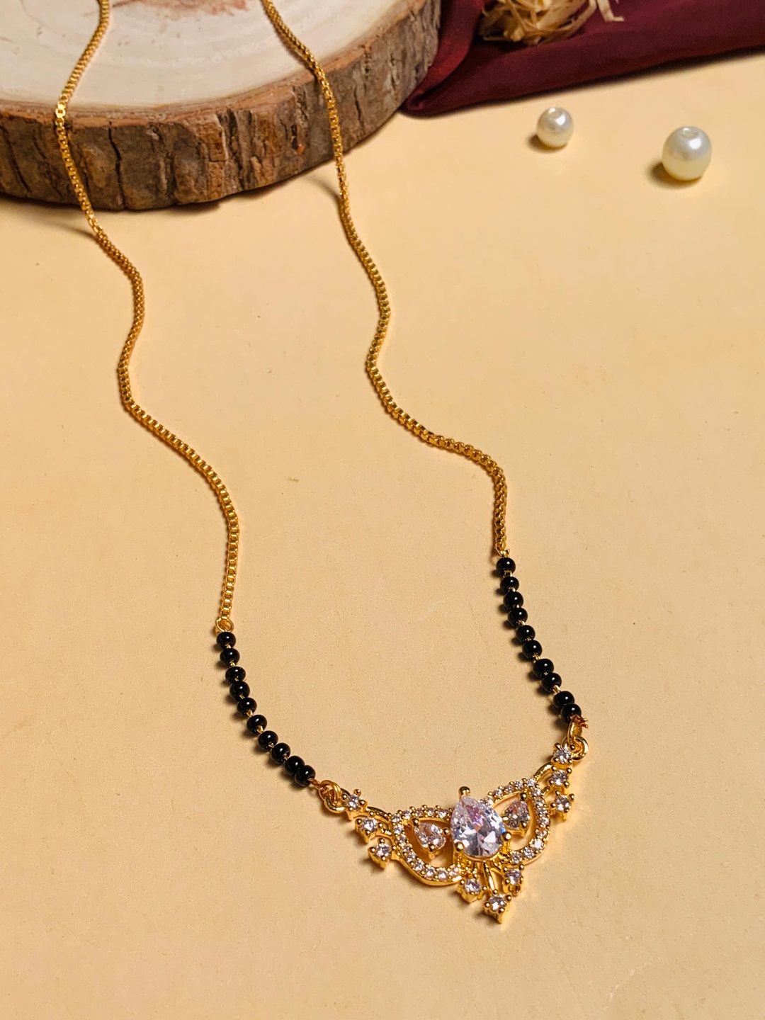 

ABDESIGNS Gold-Plated AD Stone-Studded & Beaded Mangalsutra