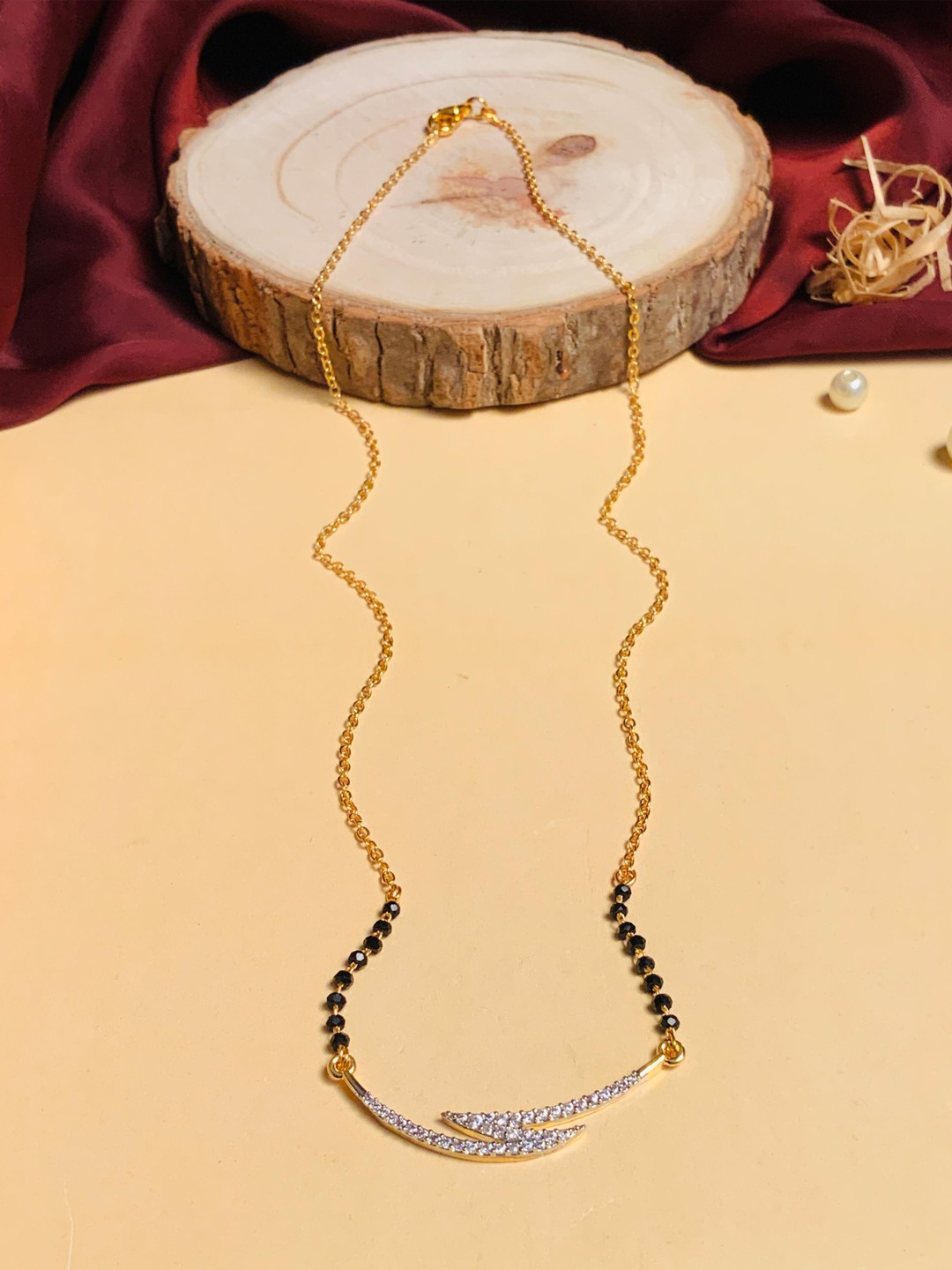 

ABDESIGNS Gold Plated American Diamond Studded & Beaded Mangalsutra
