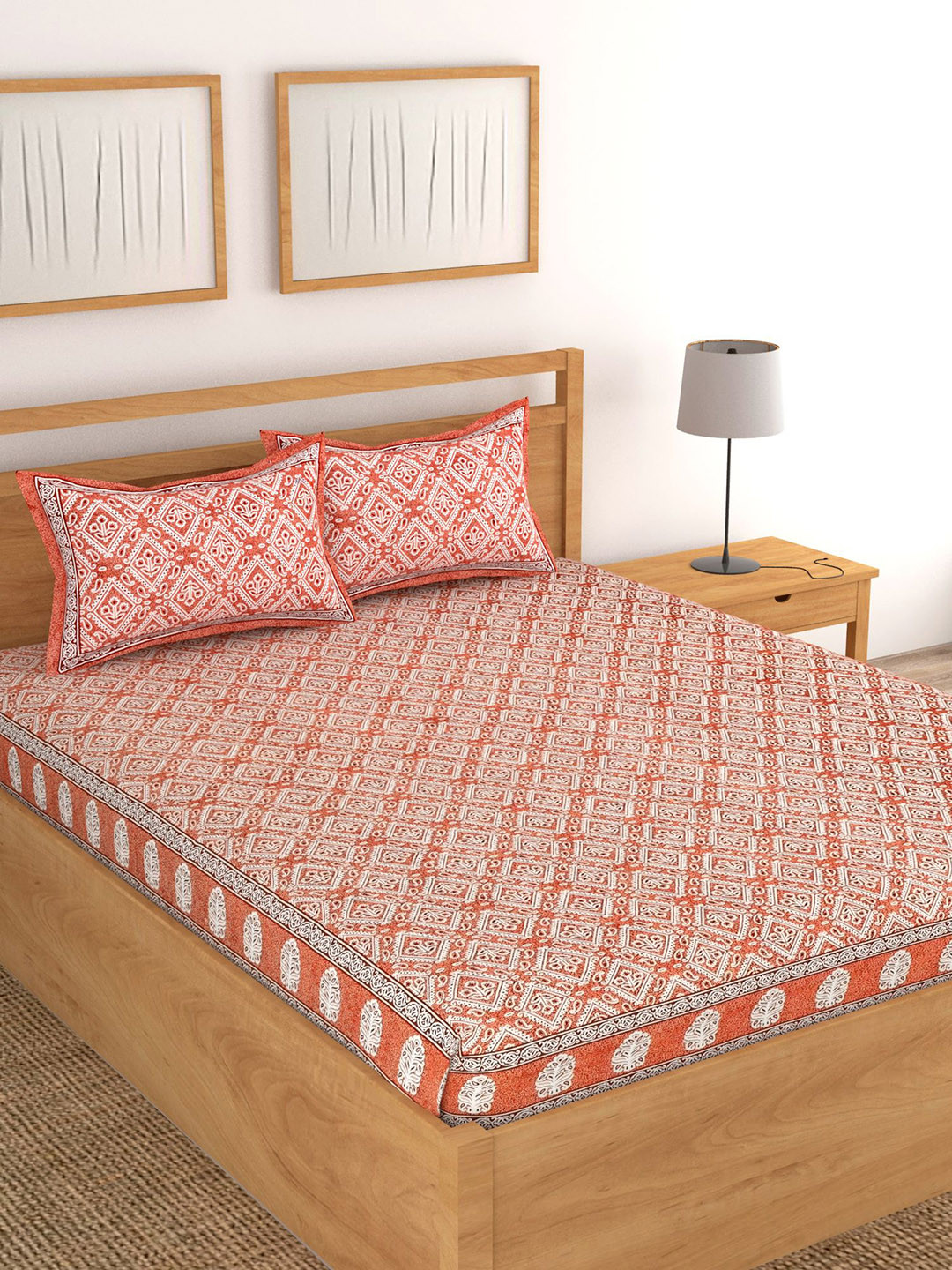 

Lali Prints Orange & White Ethnic Motifs Cotton 180 TC King Bedsheet With 2 Pillow Covers