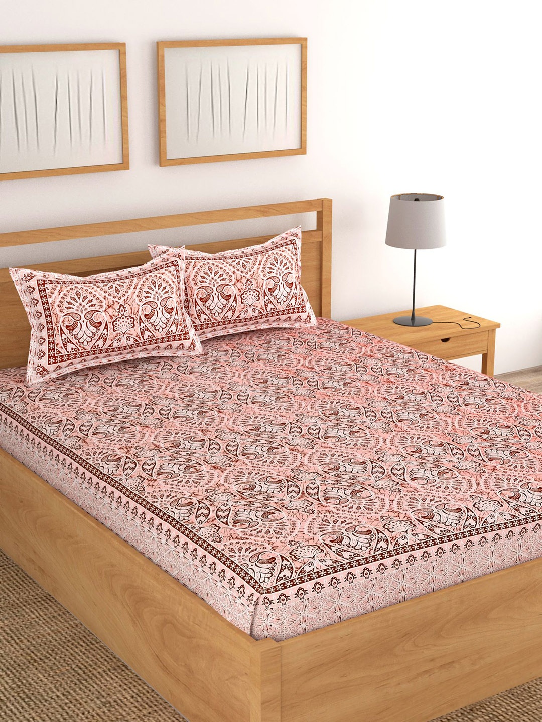 

Lali Prints Peach & White Ethnic Motifs Cotton 180 TC King Bedsheet with 2 Pillow Covers