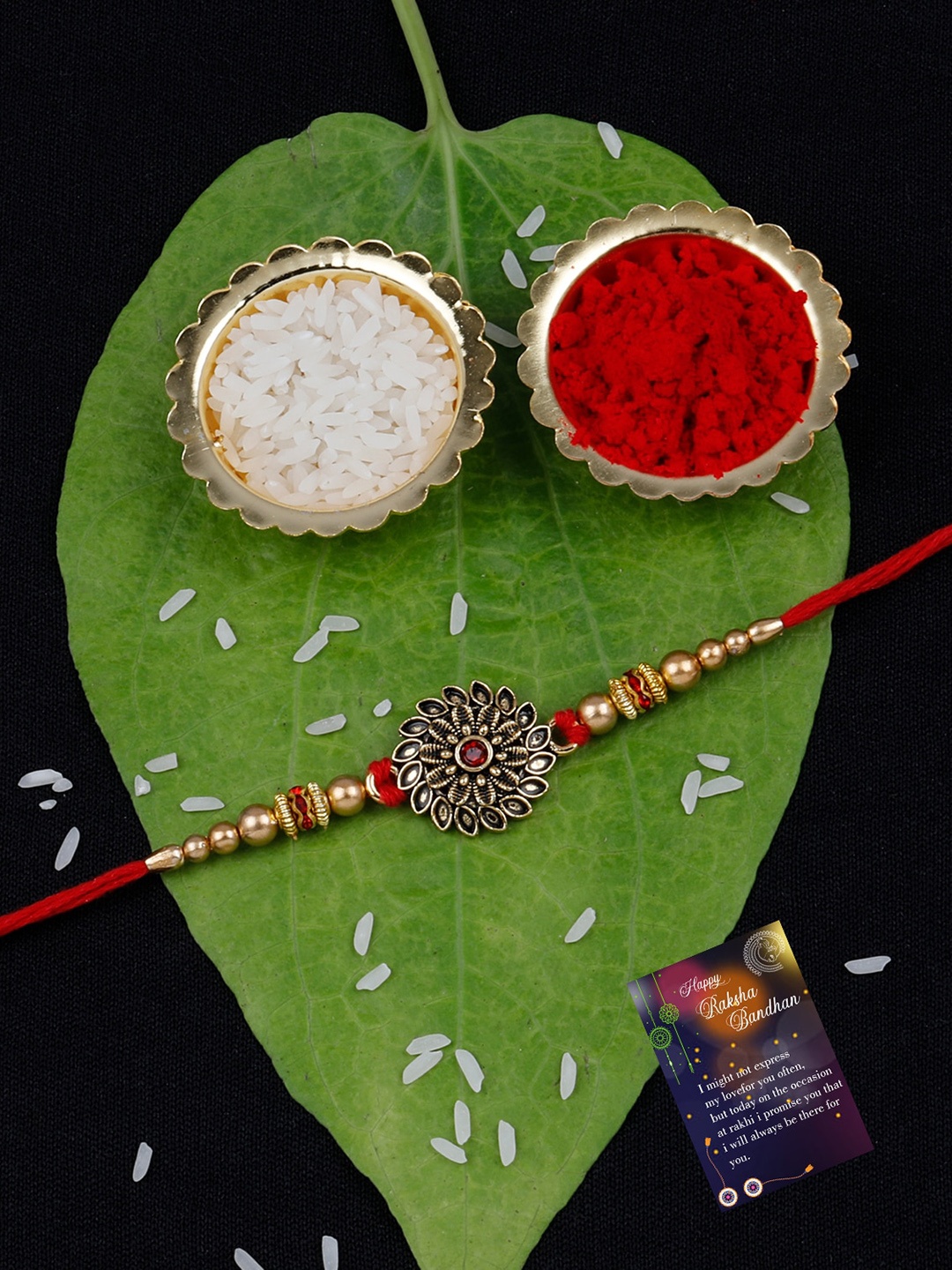 

Silver Shine Unisex Set Of 2 Charm Detail Rakhis With Roli Chawal & 1 Greeting Card, Red