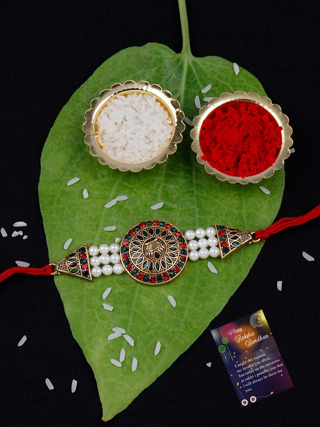 

Silver Shine Set Of 2 Beaded Thread Rakhi With Greeting Card & Roli Chawal, Red