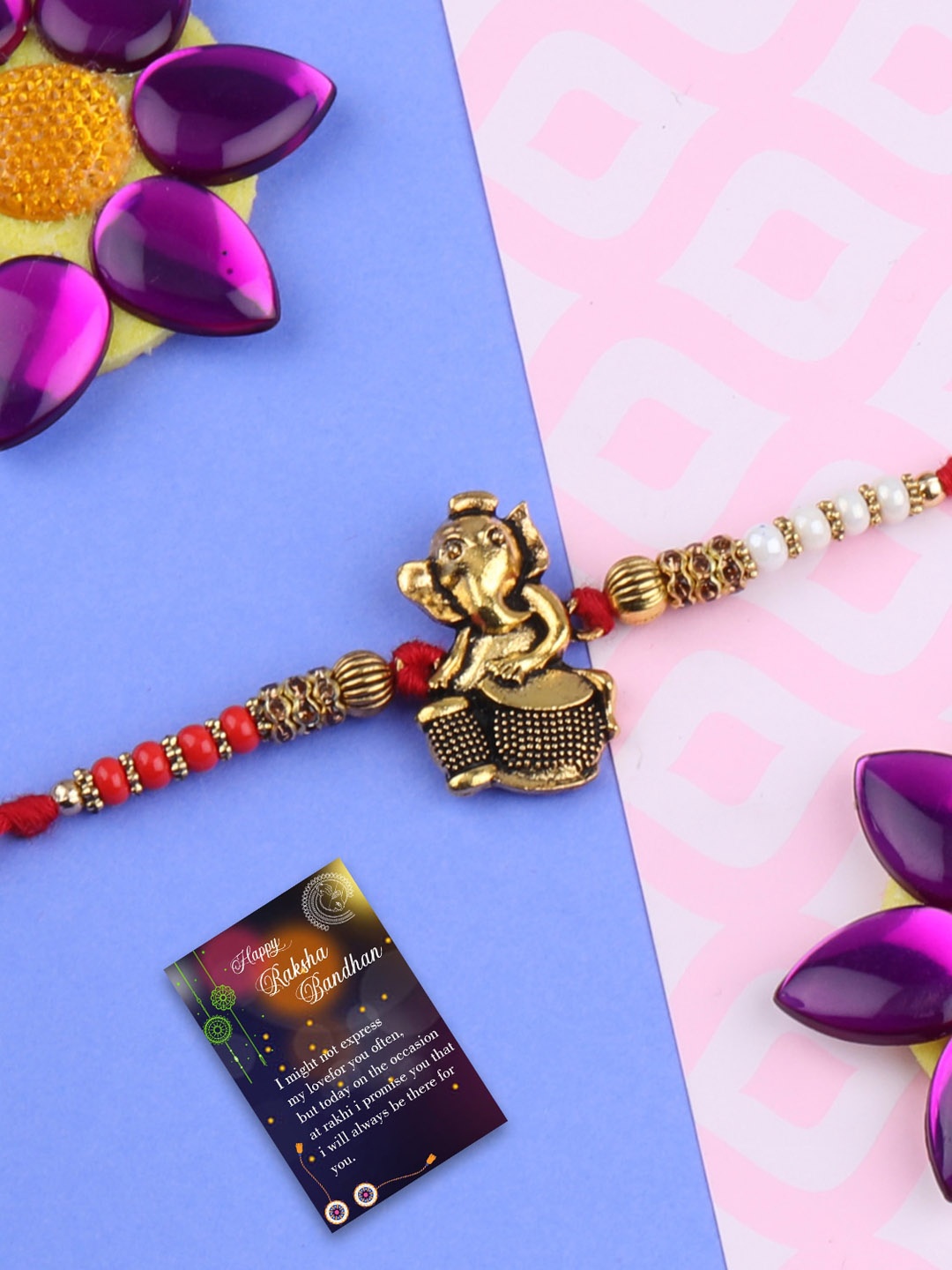 

Silver Shine Set Of 2 Charm Detail Rakhis With Greeting Card & Roli Chawal, Gold