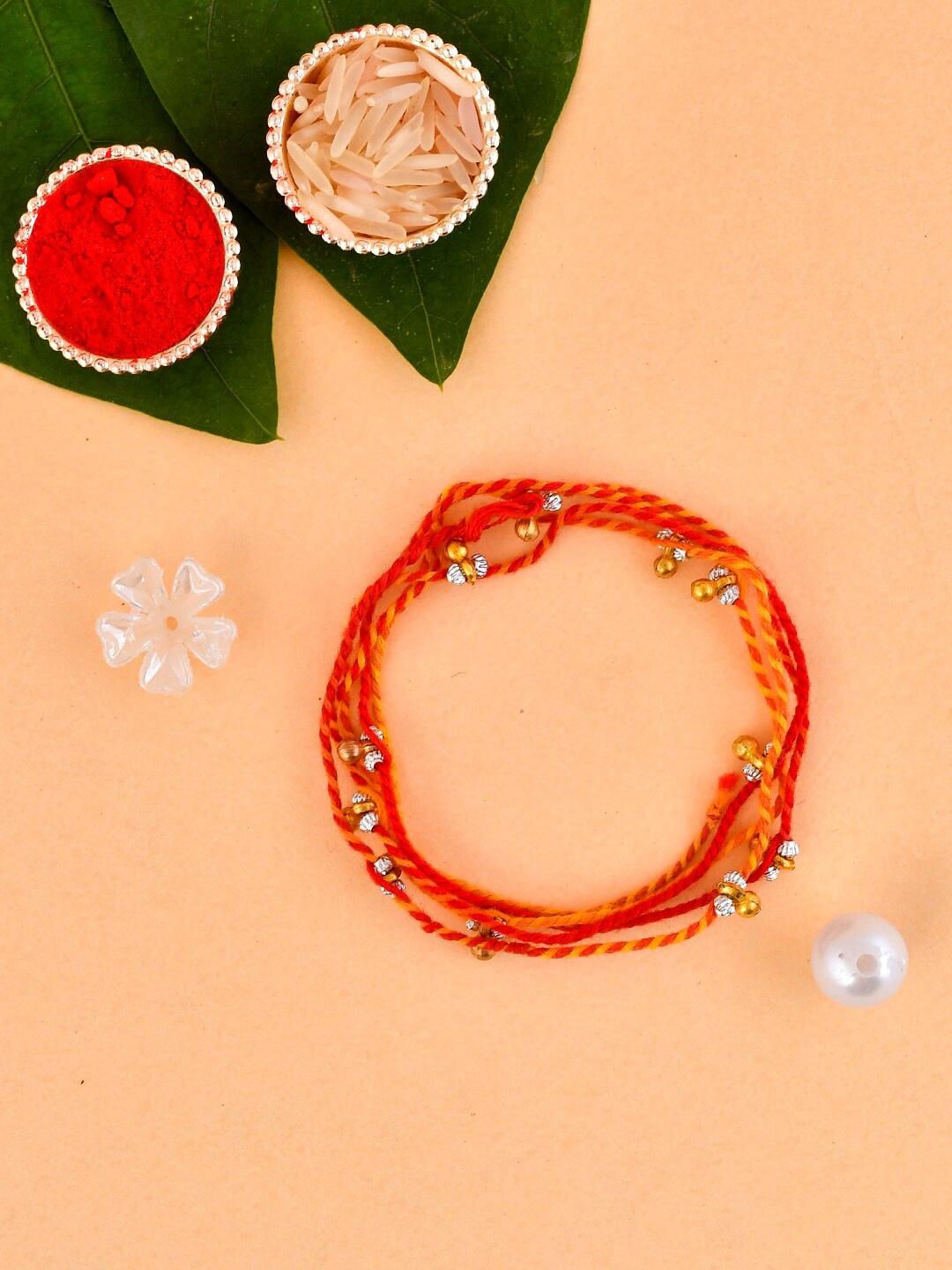 

Aapno Rajasthan Beaded & Ghungroo Rakhi, Red