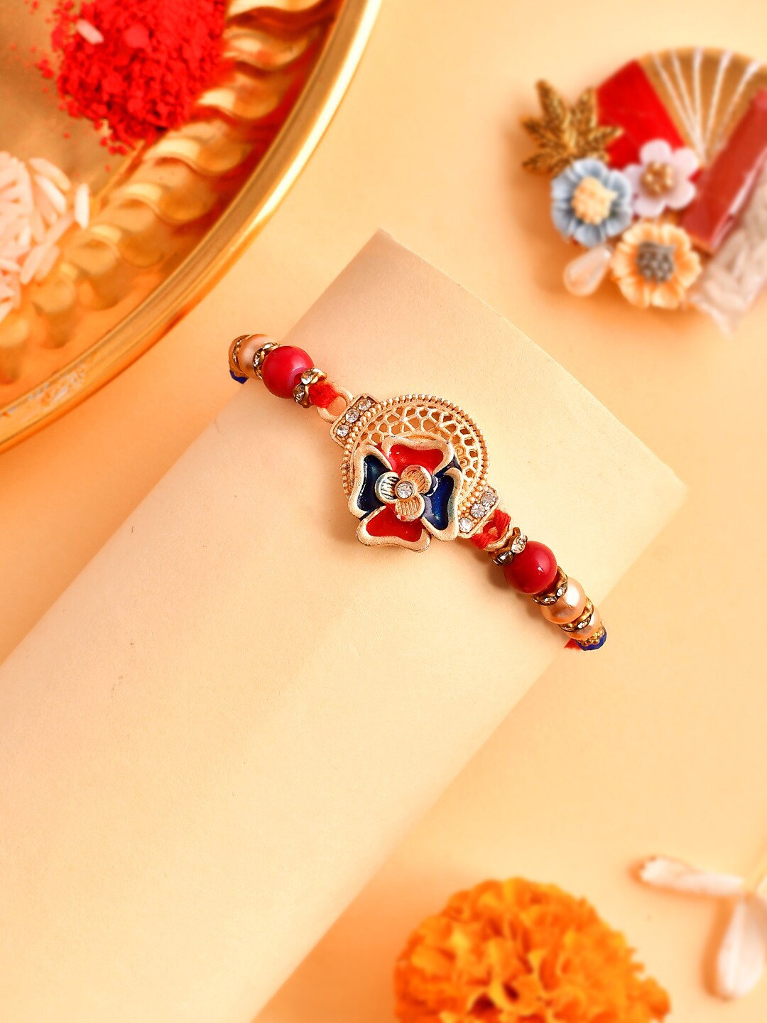 

Aapno Rajasthan Stone-Beaded Thread Rakhi, Gold