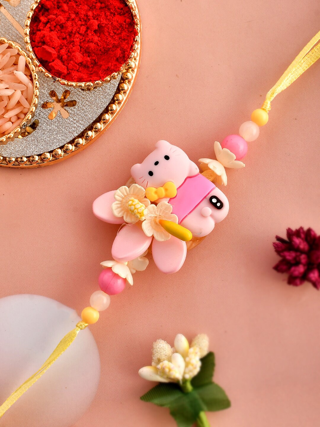 

Aapno Rajasthan Unisex Kitty Charm Beaded Rakhi With RoliChawal&Card, Pink