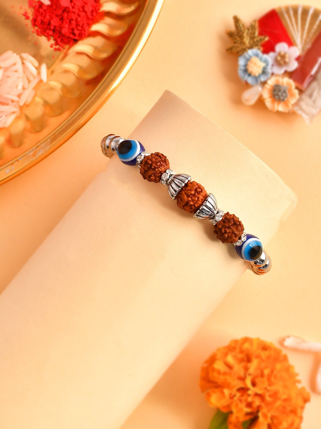 

Aapno Rajasthan Rudrakh & Evil Eye Beaded Rakhi, Silver