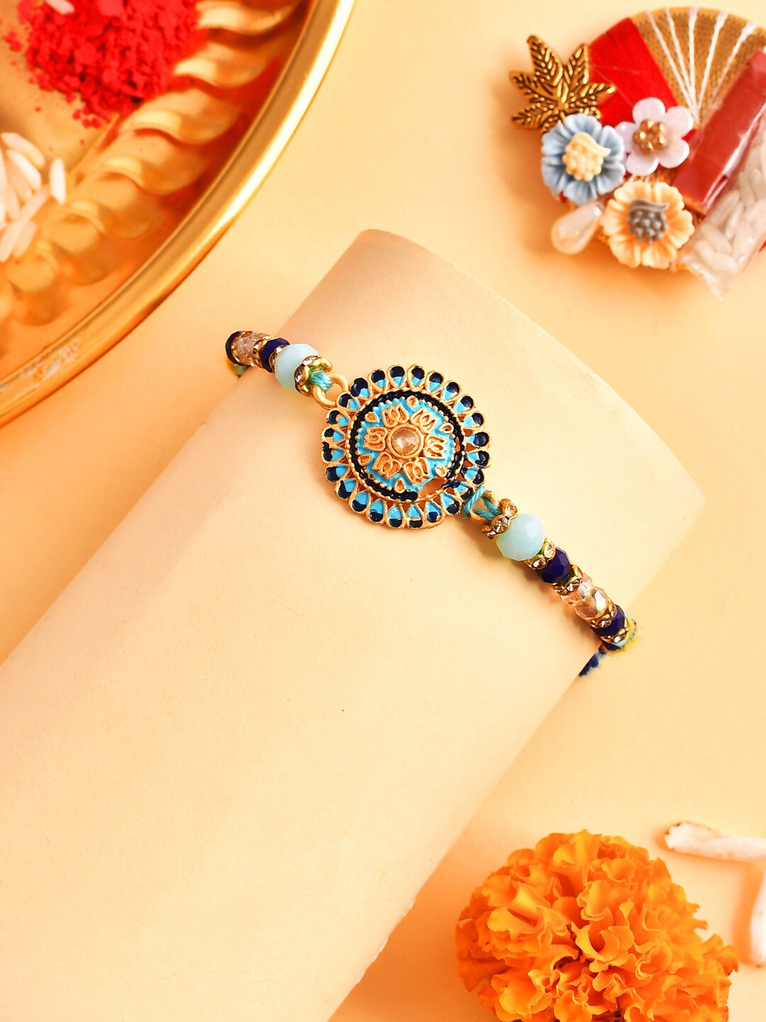 

Aapno Rajasthan Unisex Stone-Studded & Beaded Rakhi, Blue