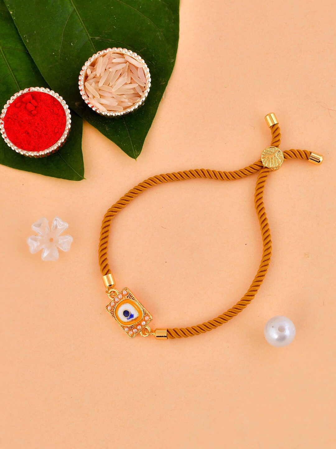 

Aapno Rajasthan Unisex Evil Eye Charm Beaded Rakhi With RoliChawal&Card, Yellow