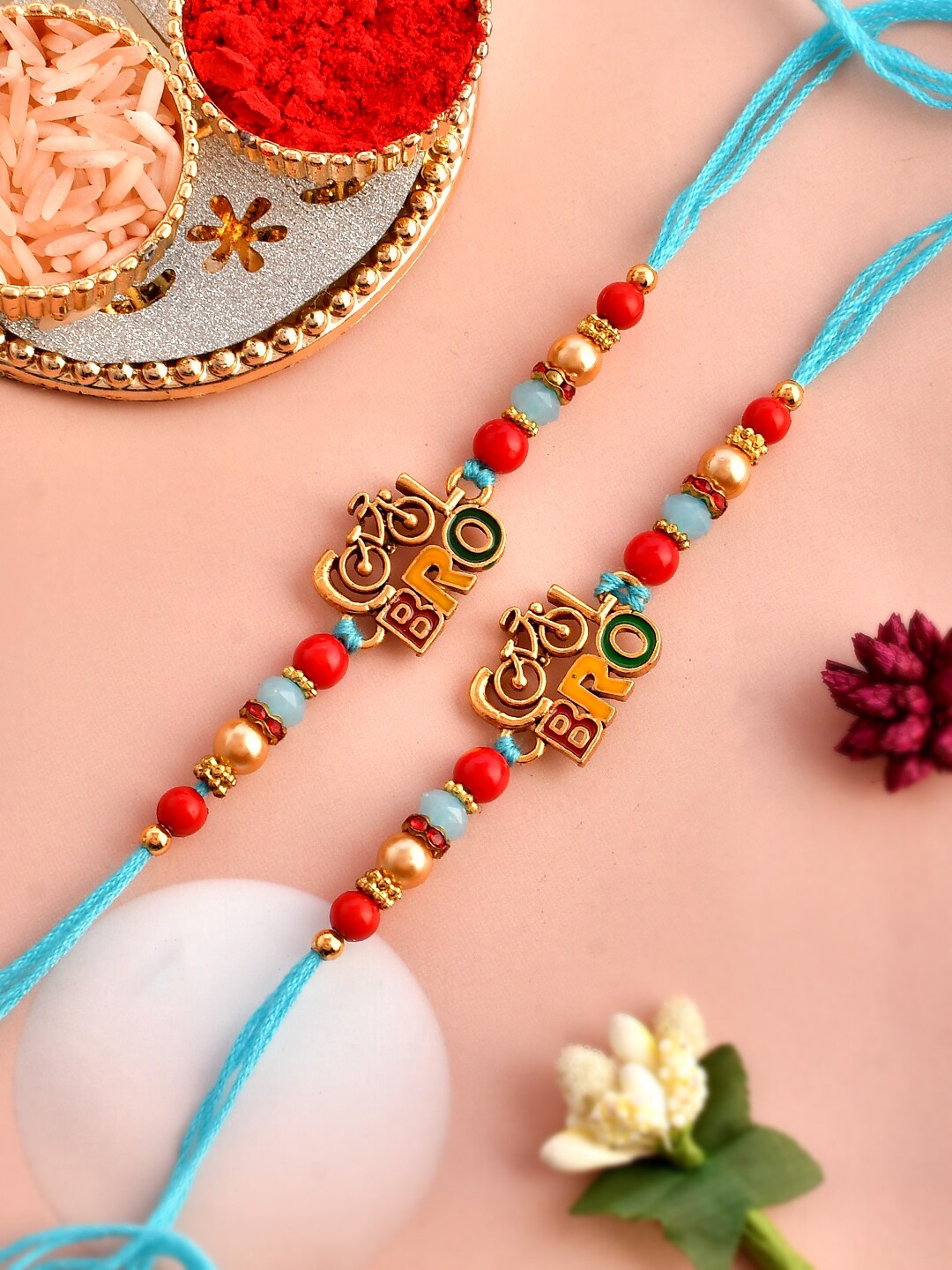 

Aapno Rajasthan Unisex Set Of 2 Charm Detail Rakhis, Gold