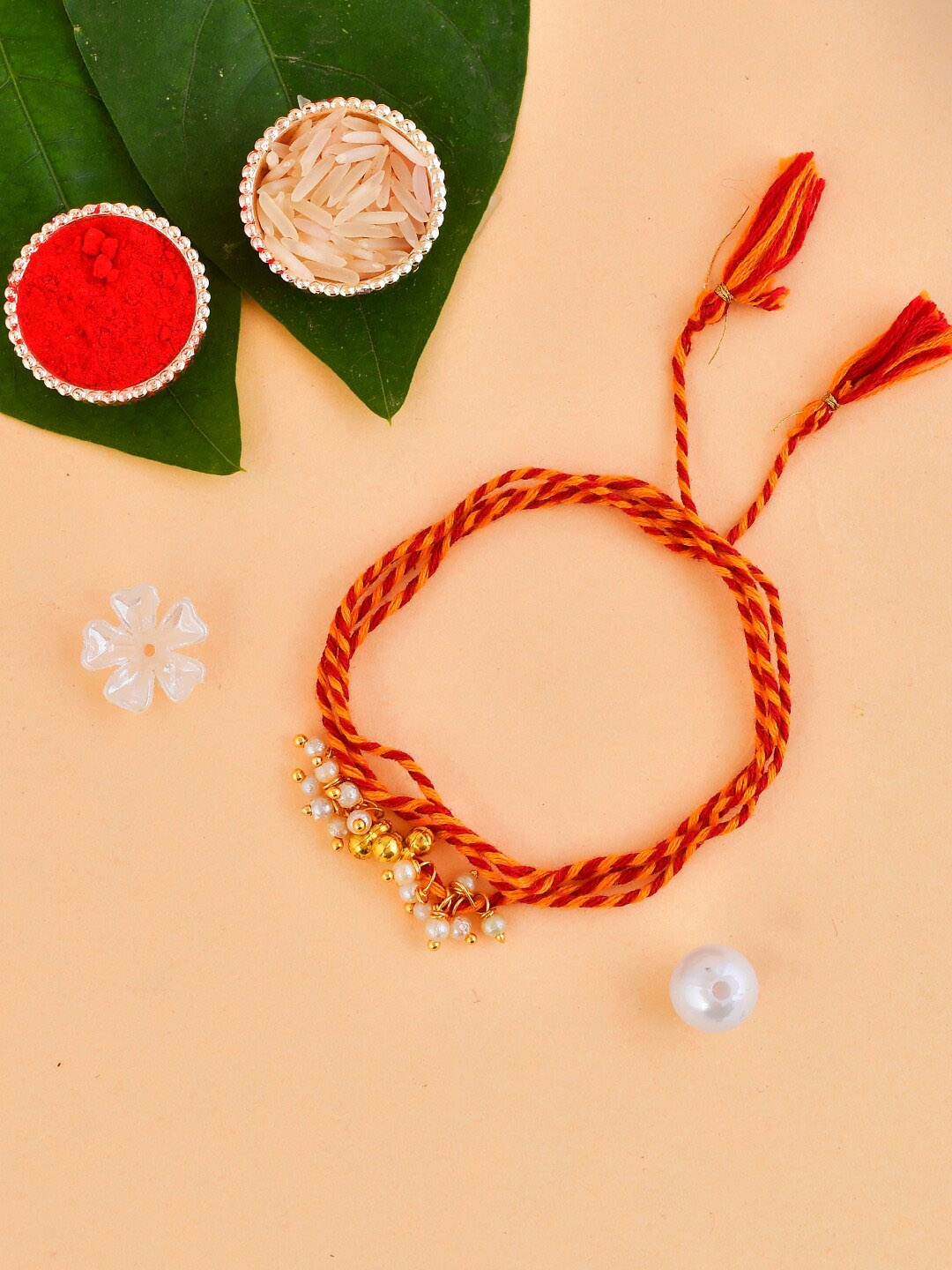 

Aapno Rajasthan Ghungroo & Beaded Rakhi, Red