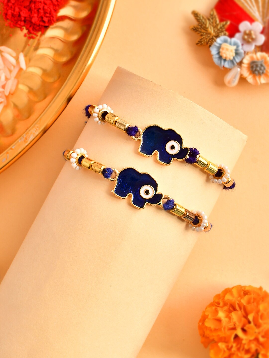

Aapno Rajasthan Set Of 2 Elephant Charm Detail Rakhis, Gold