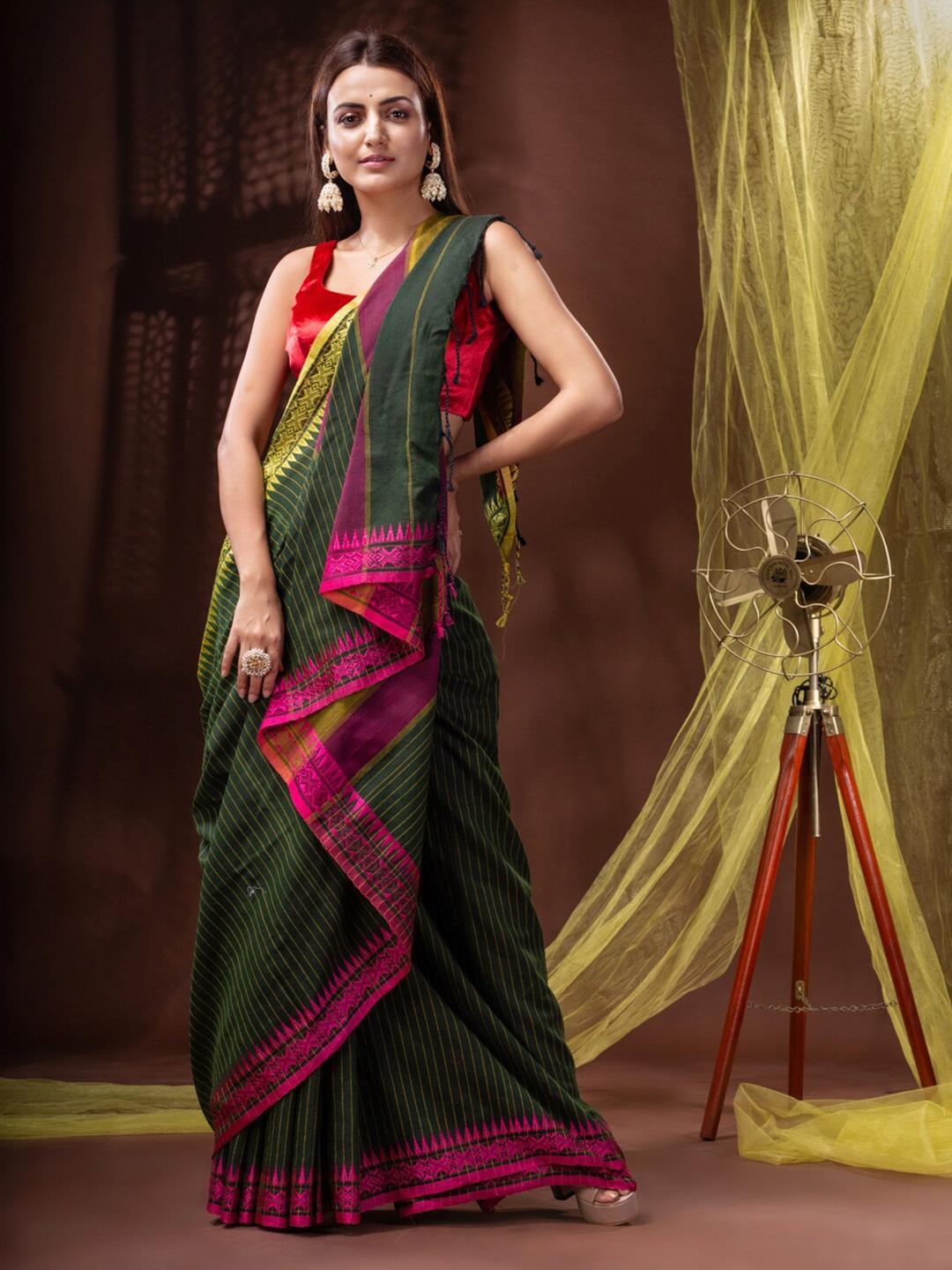 

Mitera Green & Magenta Striped Pure Cotton Handloom Saree