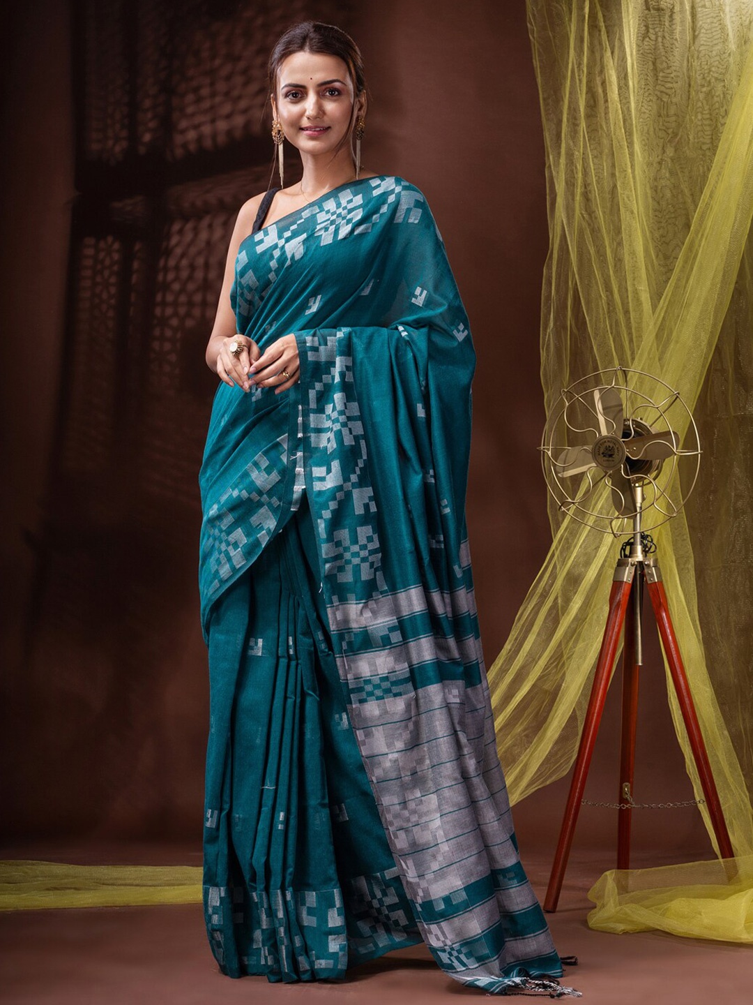 

Mitera Turquoise Blue & White Woven Design Pure Cotton Saree