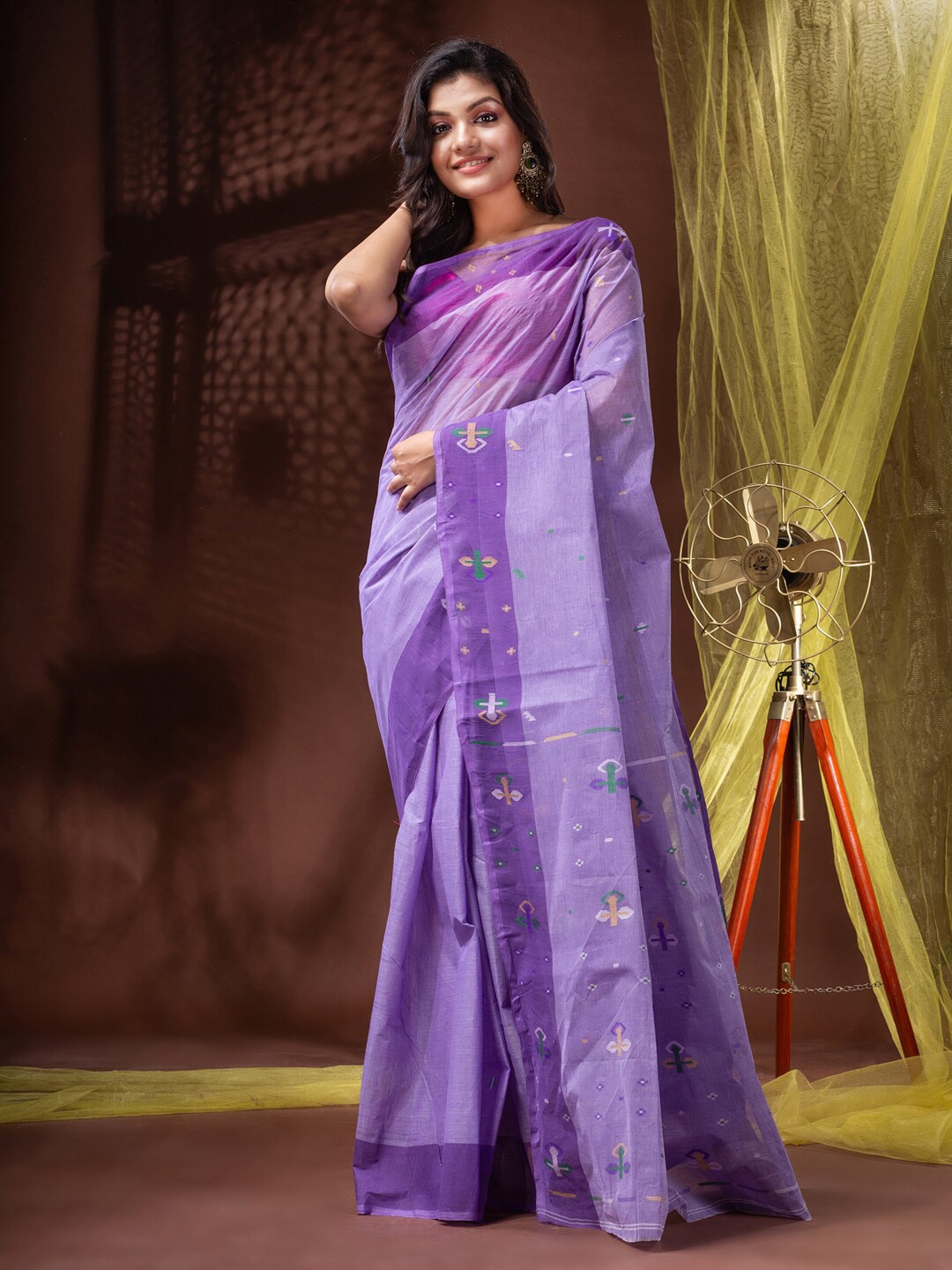 

Mitera Purple & White Floral Woven Design Zari Pure Cotton Handloom Saree