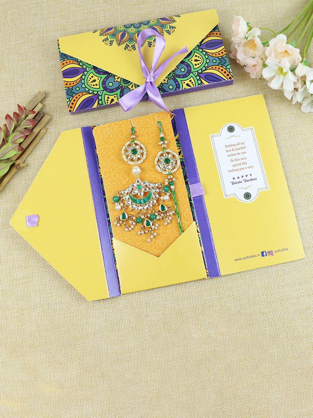 

Asthetika Unisex Set Of 2 Stone-Studded & Beaded Rakhi & Lumba Envelope, Gold