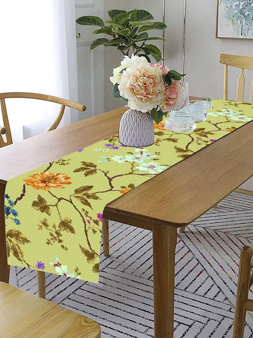 

Lushomes Yellow 6 Seater Printed Rectangular Table Runner