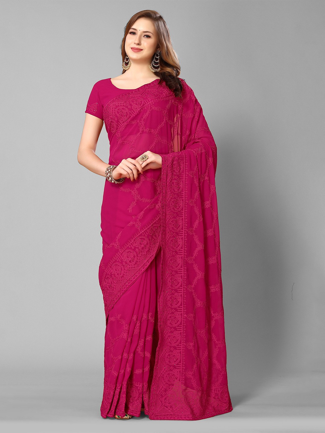 

Mitera Pink Ethnic Motifs Embroidered Pure Georgette Saree