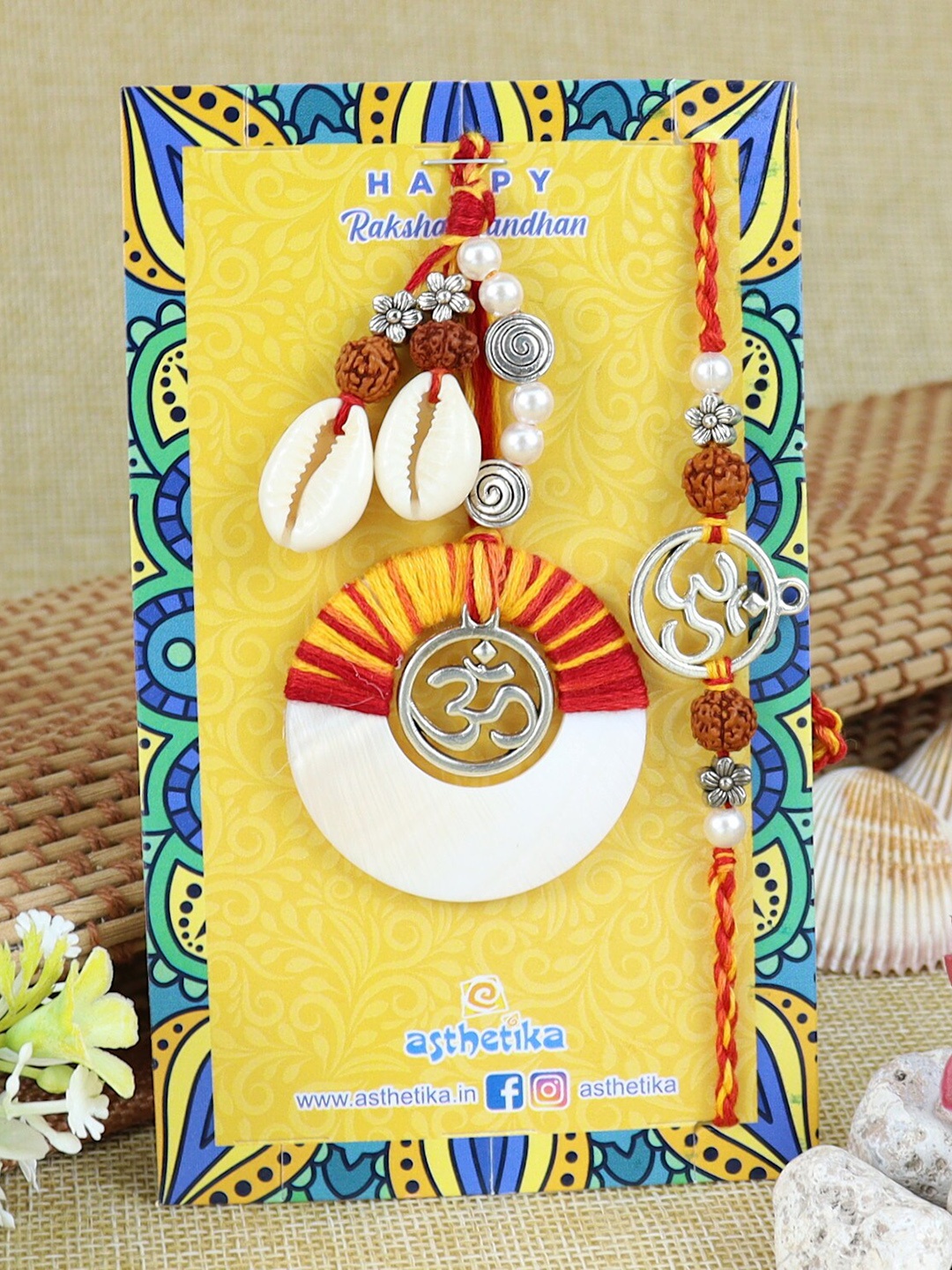 

Asthetika Set Of 2 Om Design Rakhi, Orange
