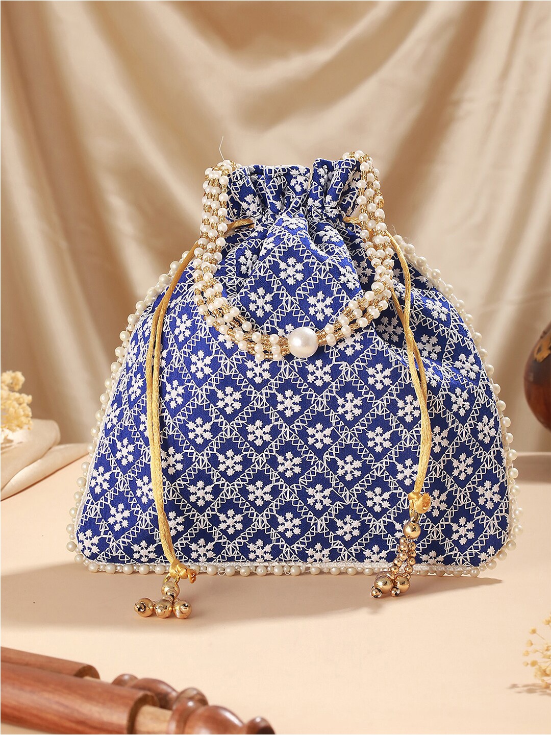 

Jazz and Sizzle Embroidered Potli Clutch, Blue