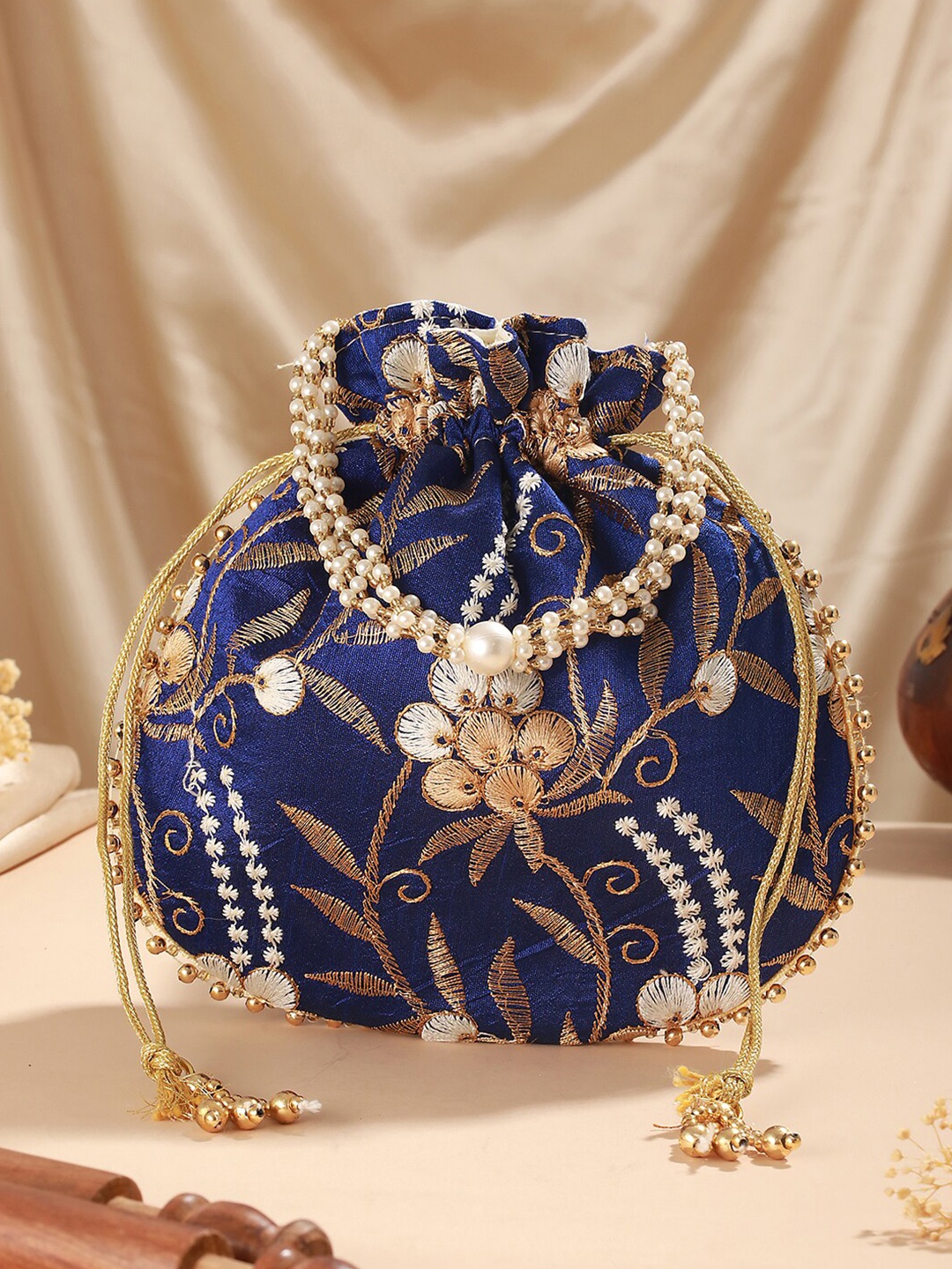 

Jazz and Sizzle Embroidered Potli Clutch, Blue