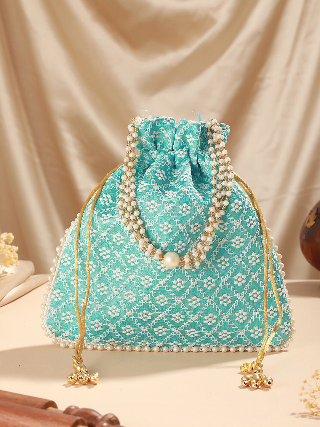 

Jazz and Sizzle Embroidered Potli Clutch, Turquoise blue