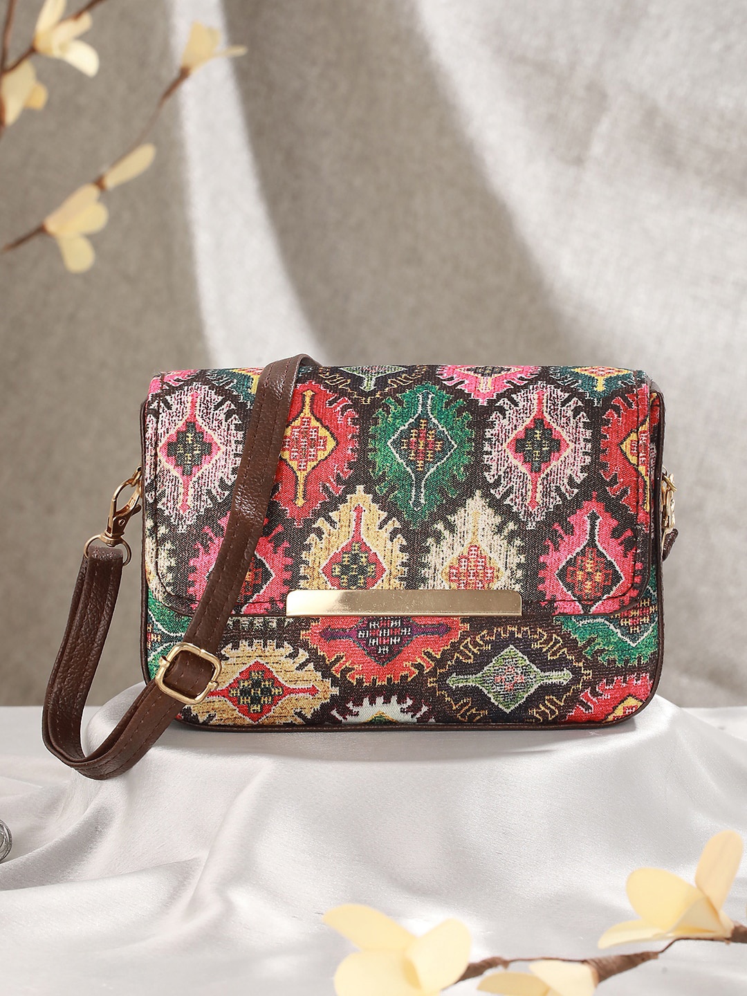 

Jazz and Sizzle Ethnic Motifs Printed Structured Sling Bag, Brown